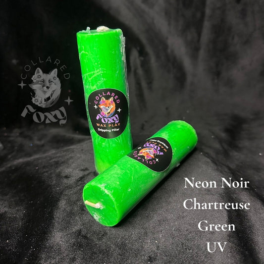 Chartreuse acid green UV reactive paraffin dripping pillar candles on black velvet with Neon Noir label
