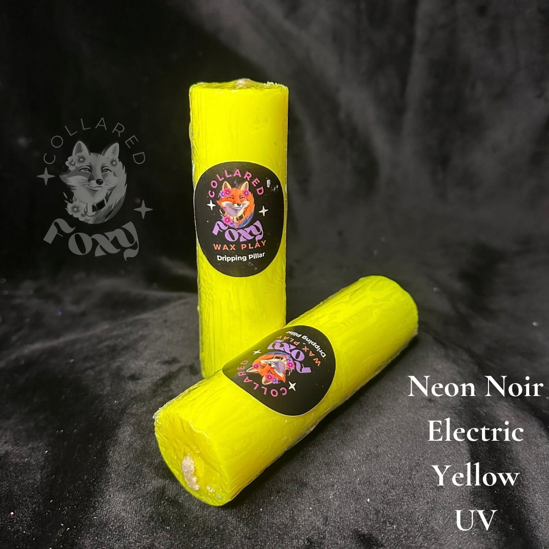 Electric yellow UV reactive paraffin dripping pillar candles on black velvet with Neon Noir label