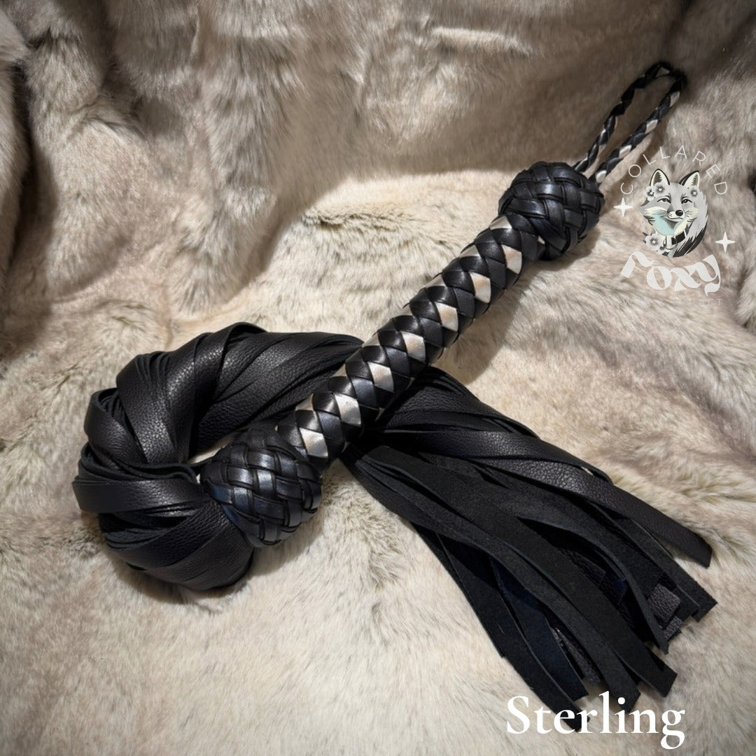 Sterling flogger, black Furla cowhide with silver and black braided handle