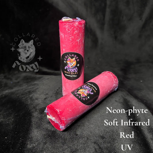 Soft Infrared red Neon-phyte pouring pillar candles on black velvet with Neon-phyte label
