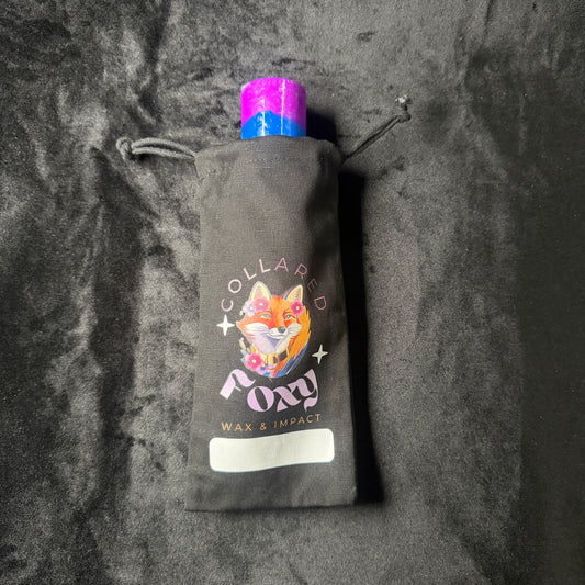 Black canvas drawstring bag with white window label, sized to hold a Collared Foxy wax play candle.