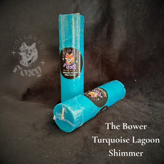 Turquoise Lagoon shimmer wax play candles, labelled, on black velvet